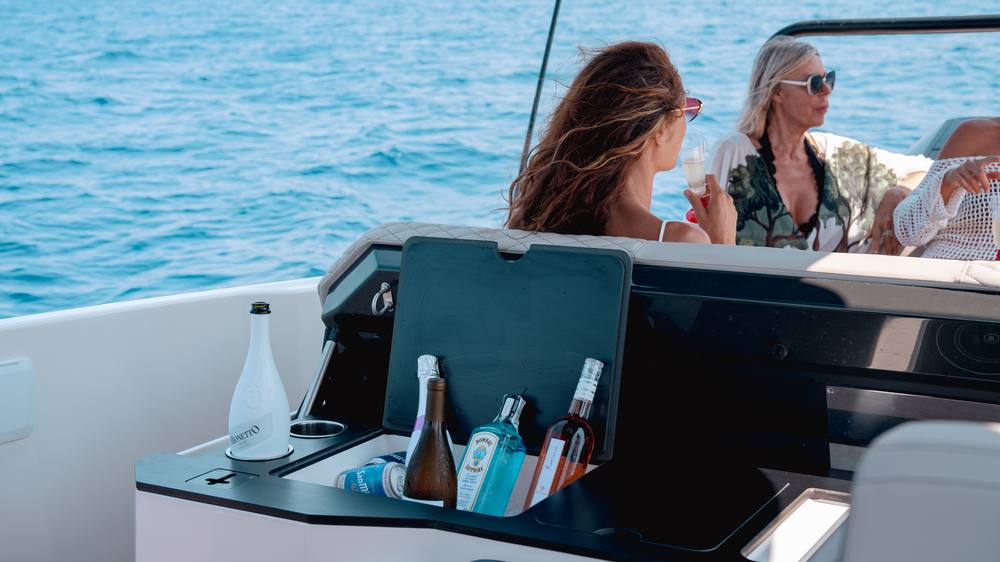 Premium onboard bar with champagne gin and cocktails on NAVAN S30 luxury boat charter Ibiza
