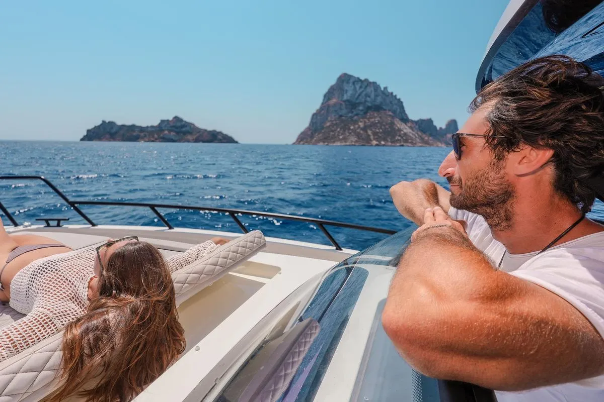 View of Es Vedrà from NAVAN S30 private boat charter Ibiza full-day west coast trip